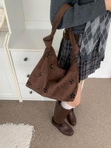 Brown Haze Flower Punching Suede Twist Shoulder Bag (Brown)