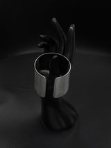 brushed silver metal bangle