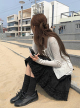 Brun Two-Button See-through Ribbed Knit Cardigan