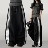 Vito coloring nylon three-line track line wide pants