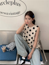 dotted sleeveless blouse