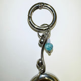 Curved pierce keychain