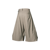 RELABEL Element of Time (cont'd) Horizontal and vertical pleats, elegantly draped silhouette, 8-minute trousers