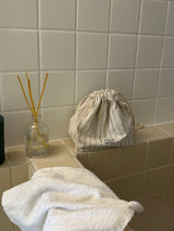 Clam string pouch _ Natural stripe