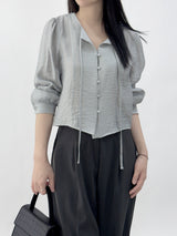 Leche Strap Button Long Sleeve Blouse