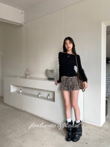 Black hole off-shoulder long-sleeved knitwear