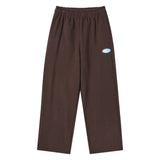 25FW BLUE OVAL LOGO LONG PANTS DARK BROWN