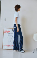 26SS★ Curved Line Track Pants