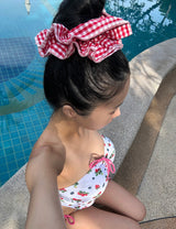 a strawberry tube top bikini