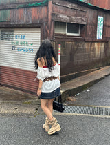 a raw paper stitch jean skirt