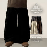 Rogle washed-out banding side pin tuck cotton wide pants