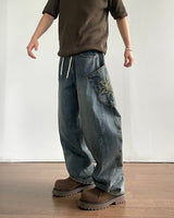 Solar embroidered denim pants