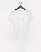 Fle strap punching puff blouse