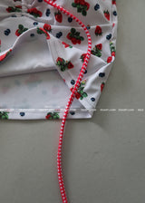 a strawberry tube top bikini