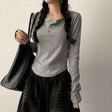 Its Hem Round Button Long Sleeve Tee