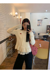 ツイステッドVネックフリルロングスリーブTシャツ
