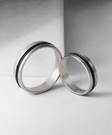 NR-302 Curved Black Line Matte Silver Surgical Ring
