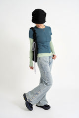 Sage cross lace denim pants