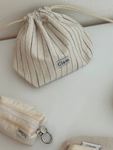 Clam string pouch _ Natural stripe