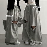 Bimbe color banding damage cutting training wide pants