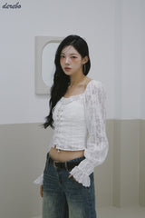 daisy punching strap frill blouse