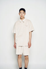 25SS TERRY LOGO EMBO SHORT SLEEVE COLLAR T-SHIRT LIGHT BEIGE