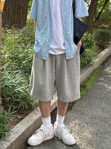 Lur One tuck Bermuda pants