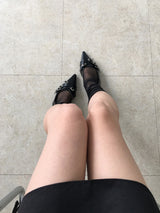Twist belt slingback flat