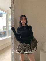 Black hole off-shoulder long-sleeved knitwear