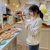 ラトビアラグランVネックニットウェア