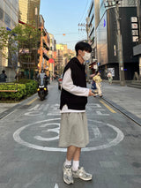 Over hood knit vest