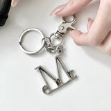DUELLA METAL LOGO KEY RING UNISEX