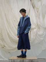 RELABEL Element of Time (cont'd) Horizontal and vertical pleats, elegantly draped silhouette, 8-minute trousers