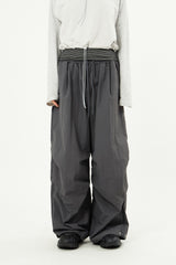 Hem snap pintuck nylon banding pants
