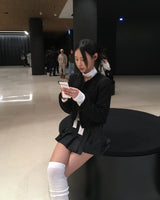 Low check button skirt