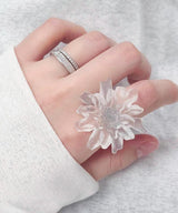 translucent white flower ring