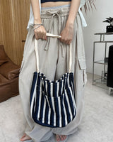 Penan striped shoulder bag