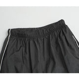 Curve line nylon pants