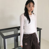 Nowell ハートカッティングシースルーテンセルウェーブUネック長袖Tシャツ