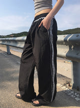 ツキン レース トラック ナイロン ワイド バンディング パンツ