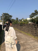 ラッフルエンベロープバッグ_ivory