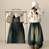 Leg hem snap side pin tuck denim wide pants