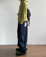 オリンプリンティドデニムパンツ