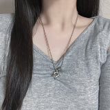 All surgical steel wave black star necklace