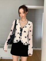 レトロフローラルラッフルロングスリーブブラウス