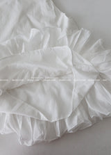 Salon frill string mini-dress