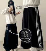 Polty 86 Numbering 3 Line Track Wide Pants
