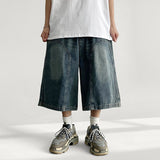 Meto incision washing denim Bermuda pants