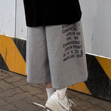 one-pocket lettering bermuda pants