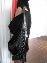 multi eyelet cross bag
